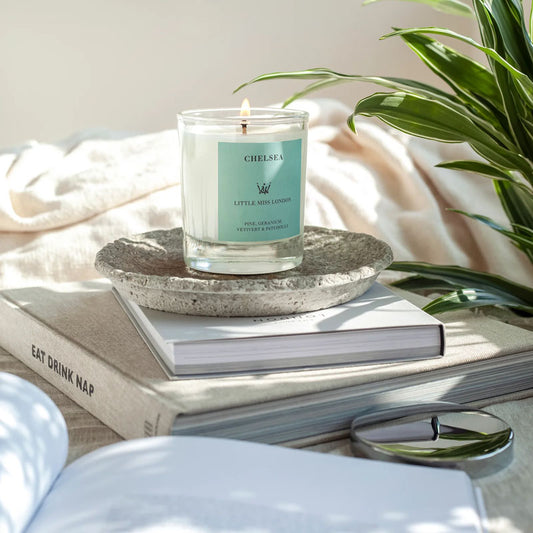 Little Miss Chelsea Candle on stand and books