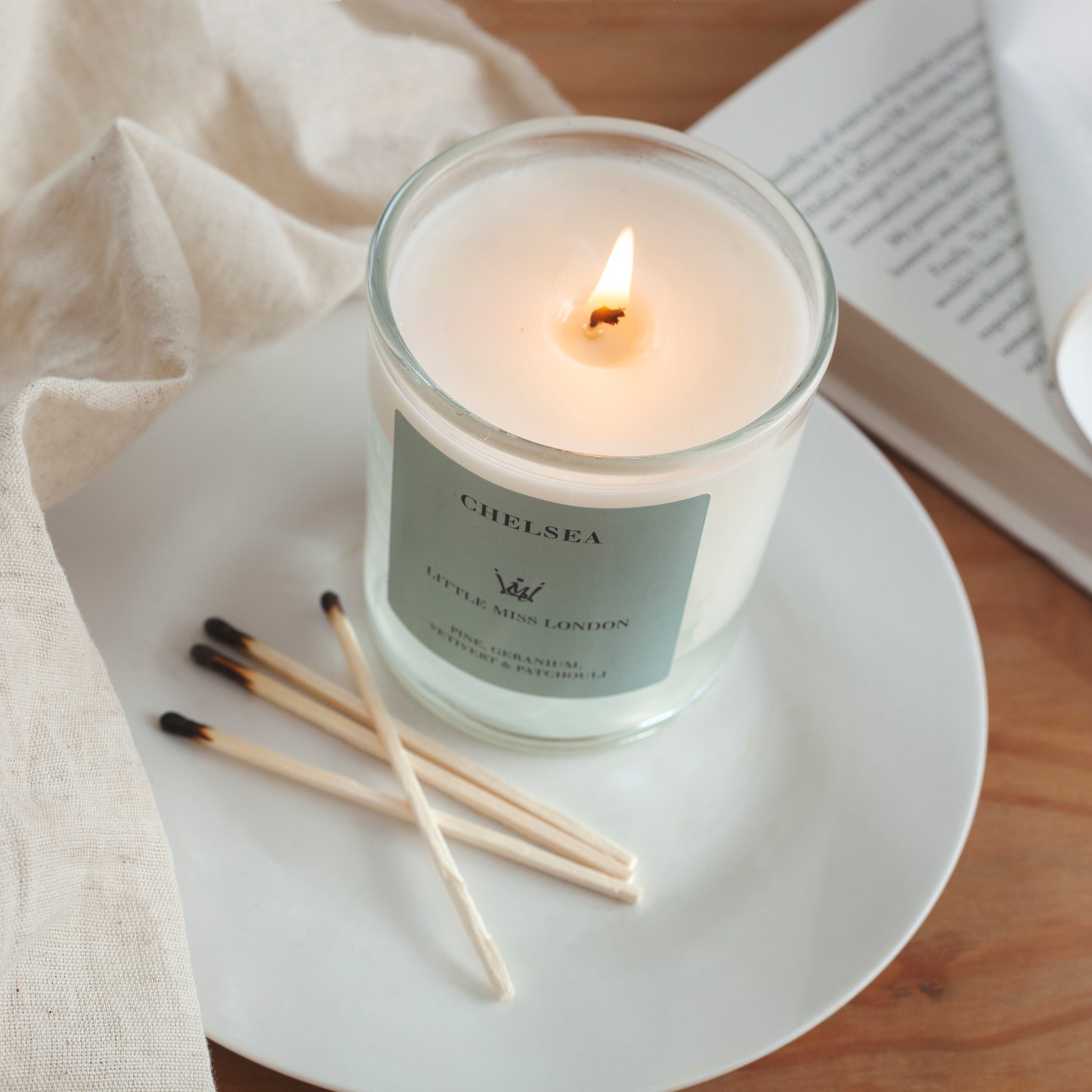 Little Miss Chelsea Candle on small white plate