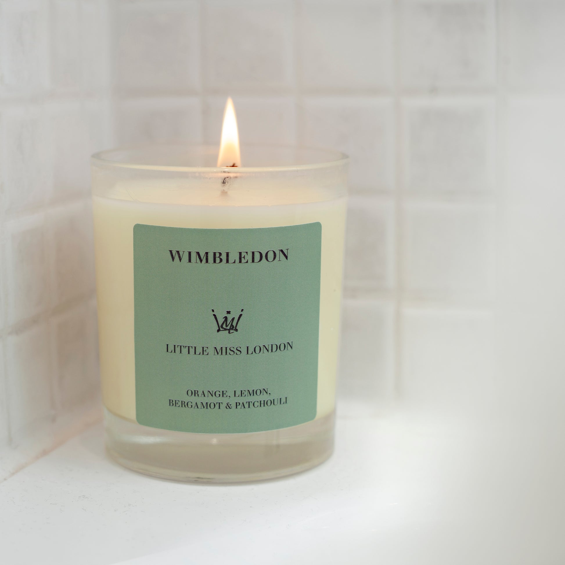 Little Miss Wimbledon Candle lit in bathroom